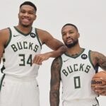 Oct 2, 2023; Milwaukee, WI, USA; Milwaukee Bucks forward Giannis Antetokounmpo (34) and guard Damian Lillard (0) pose for a picture during media day in Milwaukee. Mandatory Credit: Benny Sieu-USA TODAY Sports