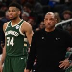 Milwaukee Bucks star Giannis Antetokounmpo beside head caoch Doc Rivers