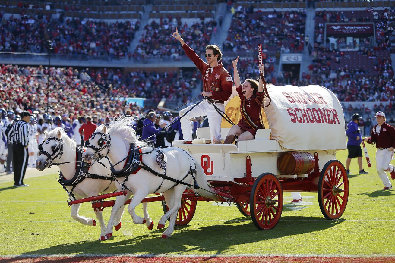 The Sooner Schooner rounds the field after a touchdown by the Oklahoma Sooners against the TCU Horned Frogs in the second quarter at Gaylord Family Oklahoma Memorial Stadium on November 24, 2023 in Norman, Oklahoma. Oklahoma won 69-45.