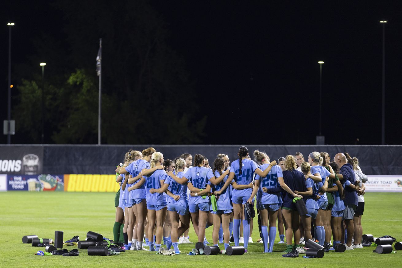 Marquette women’s soccer huddles up during a road game against Colorado.