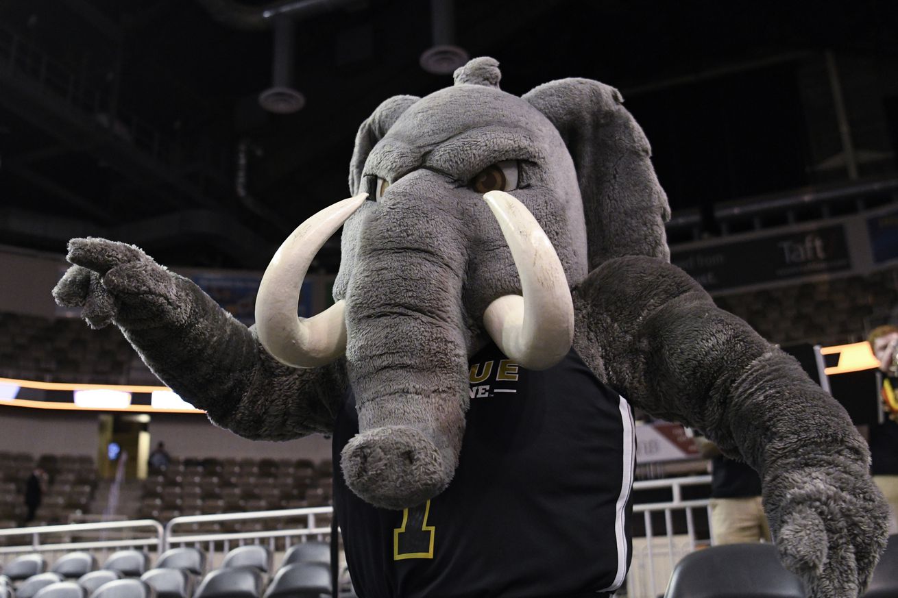 Purdue Fort Wayne mascot Don the Mastodon entertains the crowd during the Horizon League Tournament semi-final college basketball game between the Purdue Fort Wayne Mastodons and the Northern Kentucky Norse on March 7, 2022, at the Indiana Farmers Coliseum in Indianapolis, Indiana.