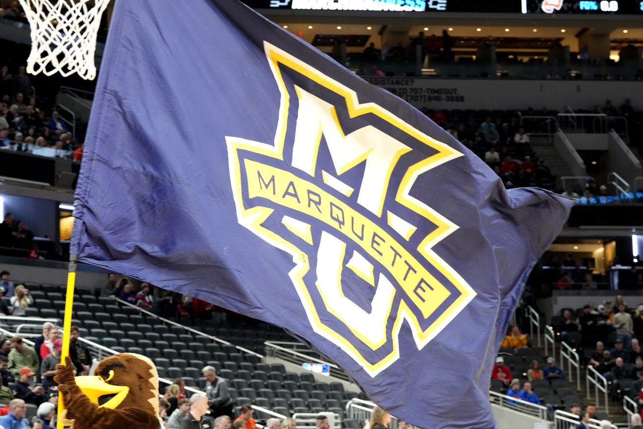 The Marquette Golden Eagles mascot Iggy runs out on the floor before the NCAA Men’s Basketball Tournament - First Round game against the Western Kentucky Hilltoppers at Gainbridge Fieldhouse on March 22, 2024 in Indianapolis, Indiana.