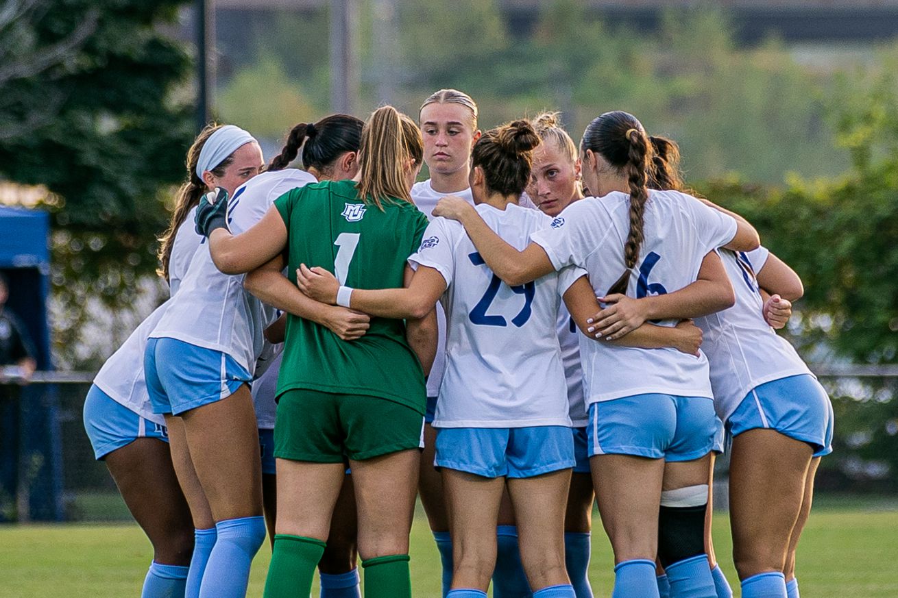 Marquette women’s soccer huddles up during a match against St. Thomas.