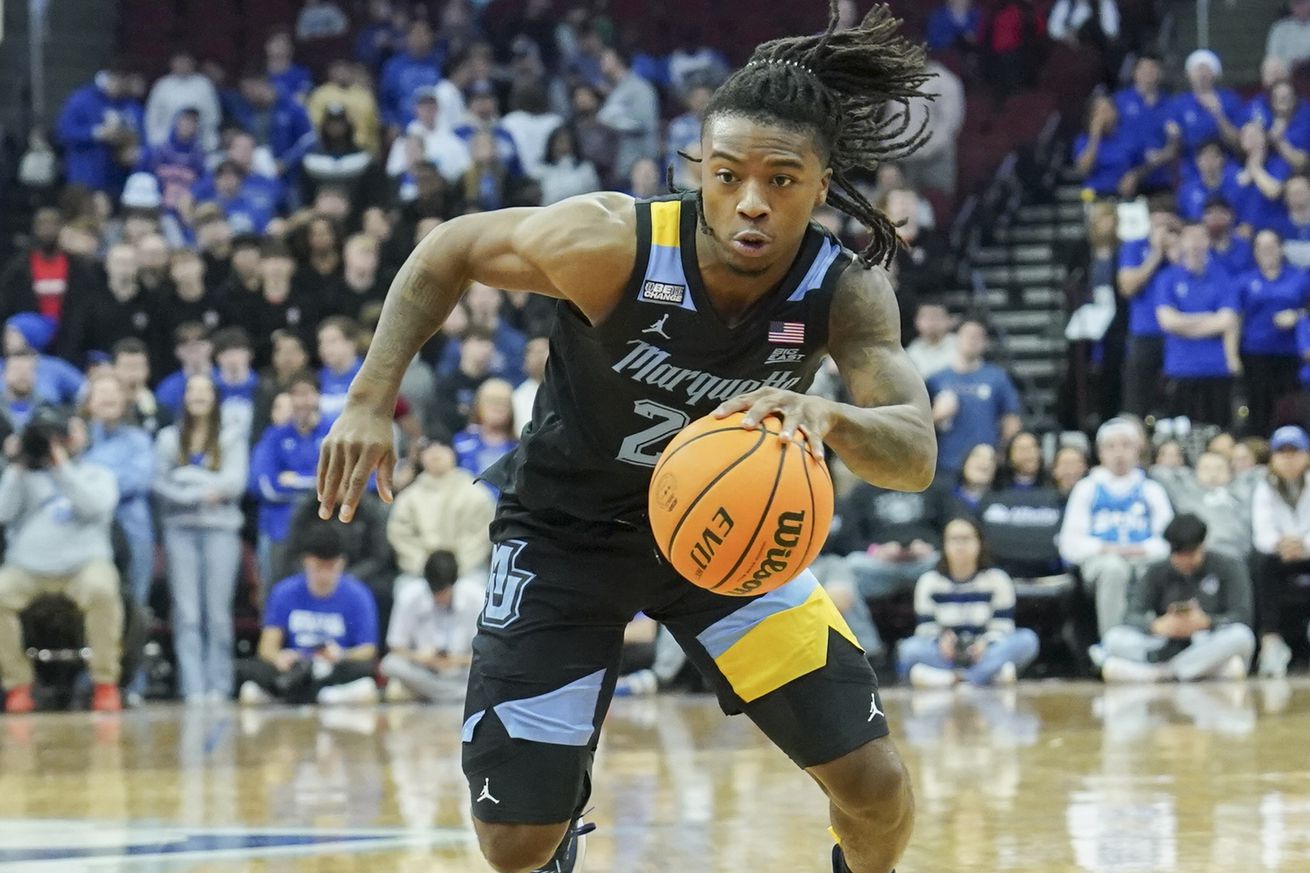 Sean Jones #22 of the Marquette Golden Eagles dribbles the ball during the game against the Seton Hall Pirates at Prudential Center on January 6, 2024 in Newark, NJ.