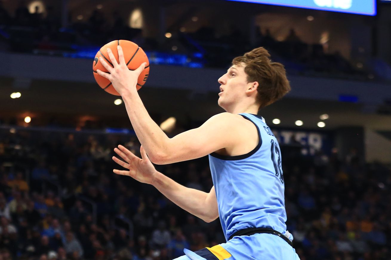 Marquette Golden Eagles forward Ben Gold (12) drives to the basket during a game between the Marquette Golden Eagles and the Providence Friars at Fiserv Forum on February 28, 2024 in Milwaukee, WI.