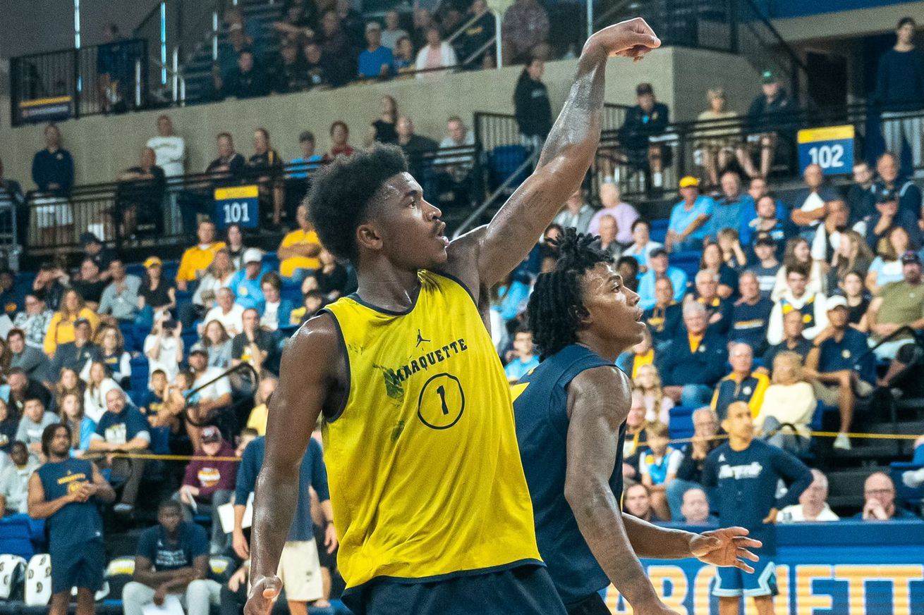 Marquette guard Kam Jones extends after shooting a three at the open scrimmage on October 5, 2024.