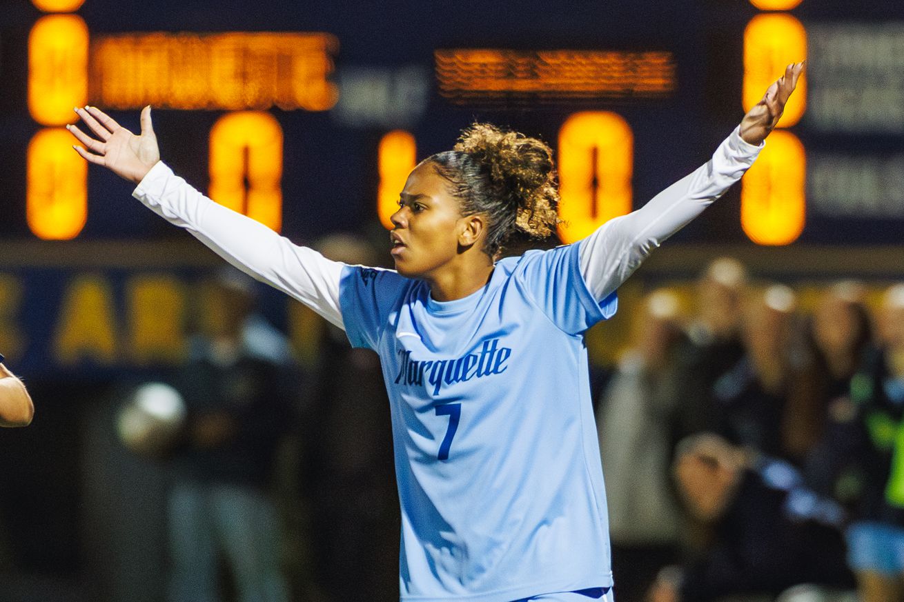 Marquette’s Kiara Clarke questions a call during a match against Villanova.