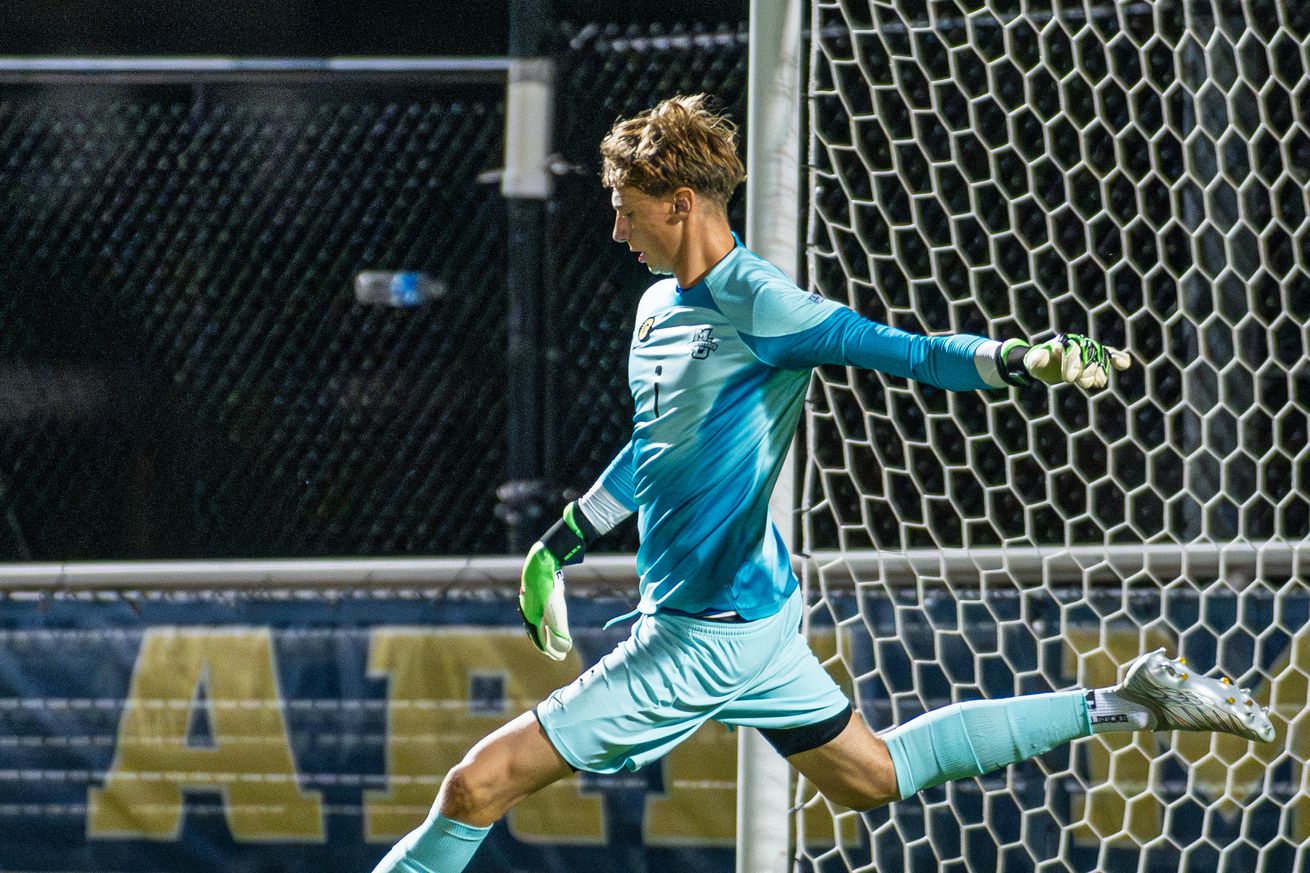 Marquette keeper Marten Brink on a goal kick.