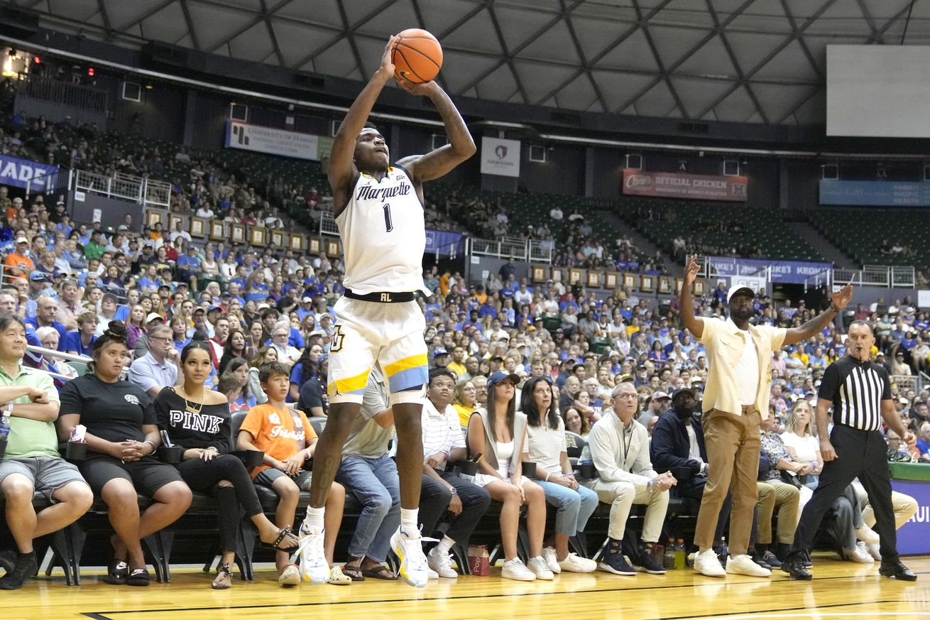 Kam Jones #1 of the Marquette Golden Eagles takes a jump shot during a college basketball game against the Kansas Jayhawks on day two of the Allstate Maui Invitational at the SimpliFi Arena at Stan Sheriff Center on November 21, 2023 in Honolulu, Hawaii.