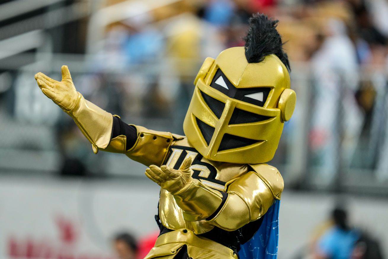 UCF Knights mascot “Knightro” interacts with the crowd during a game between the Arizona Wildcats and the UCF Knights on November 02, 2024 at FBC Mortgage Stadium in Orlando, FL