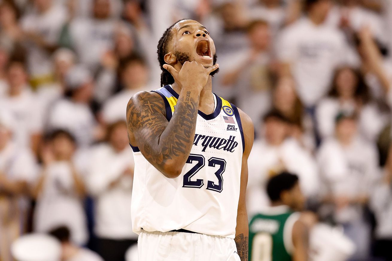 David Joplin #23 of the Marquette Golden Eagles reacts after making a three point shot in the second half of the game against the George Mason Patriots at Al McGuire Center on November 08, 2024 in Milwaukee, Wisconsin.