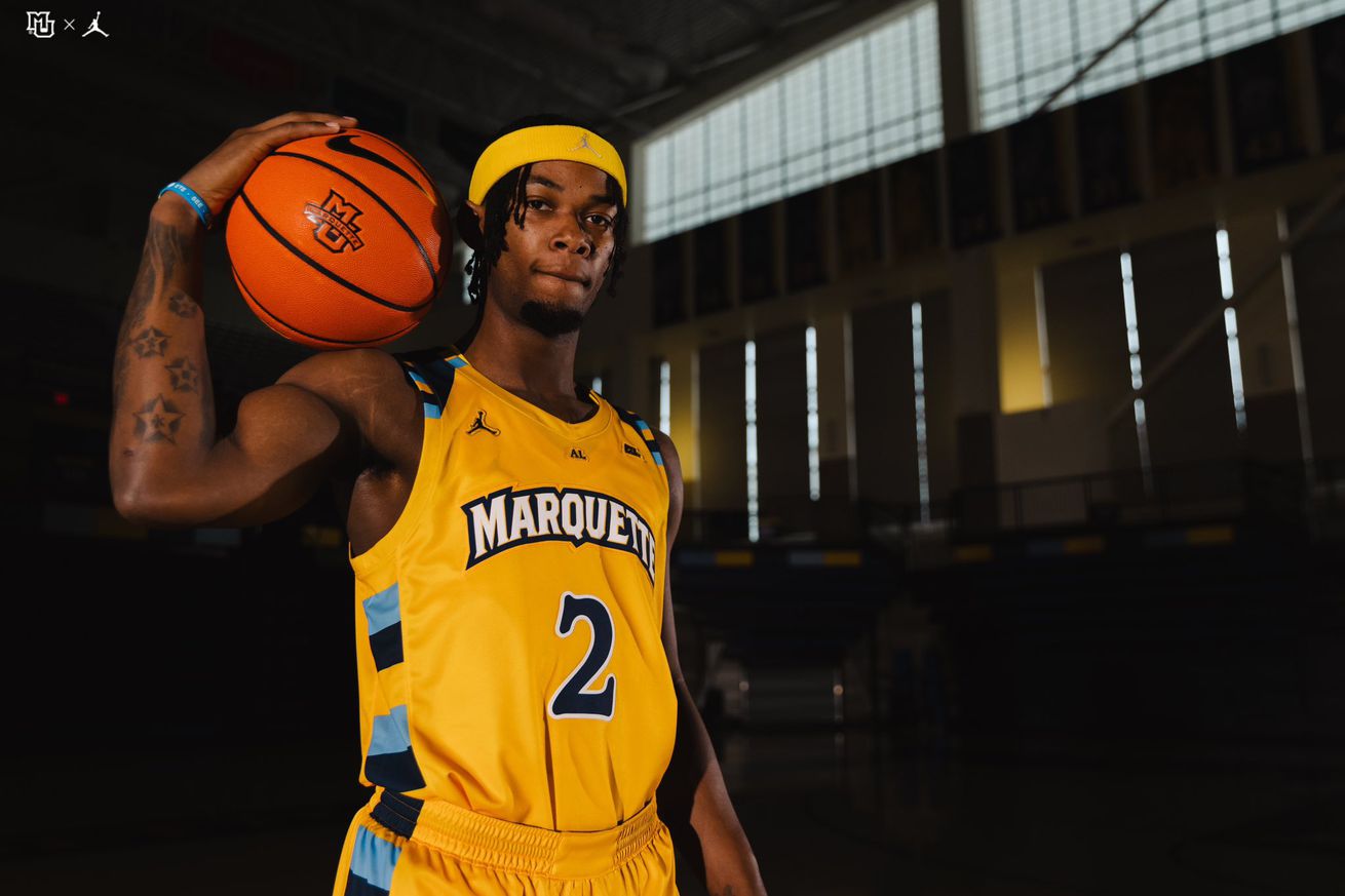 Marquette’s Chase Ross, modeling the throwback uniforms.