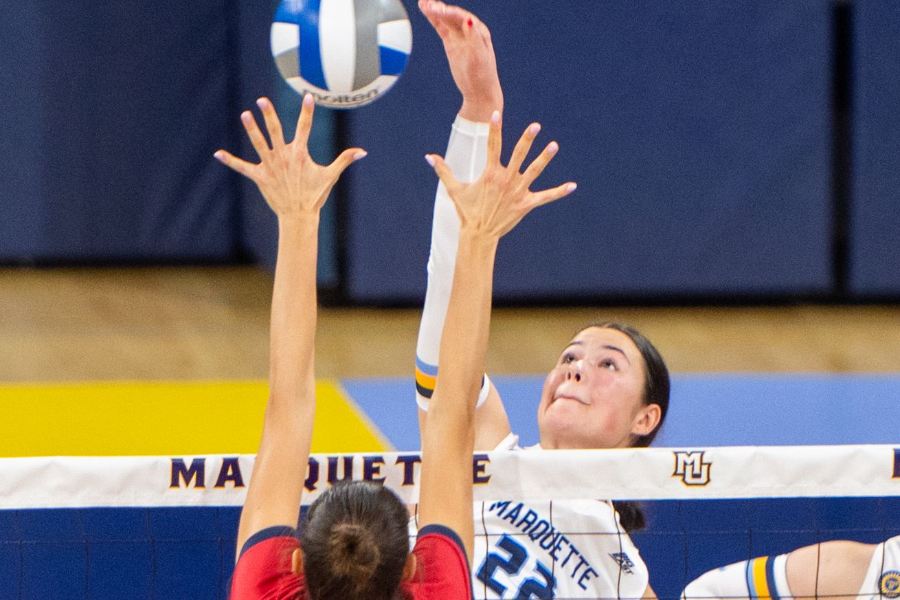 Marquette middle blocker Hattie Bray in action.