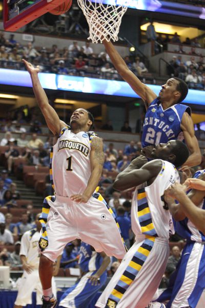 Dominic James playing for Marquette men’s basketball