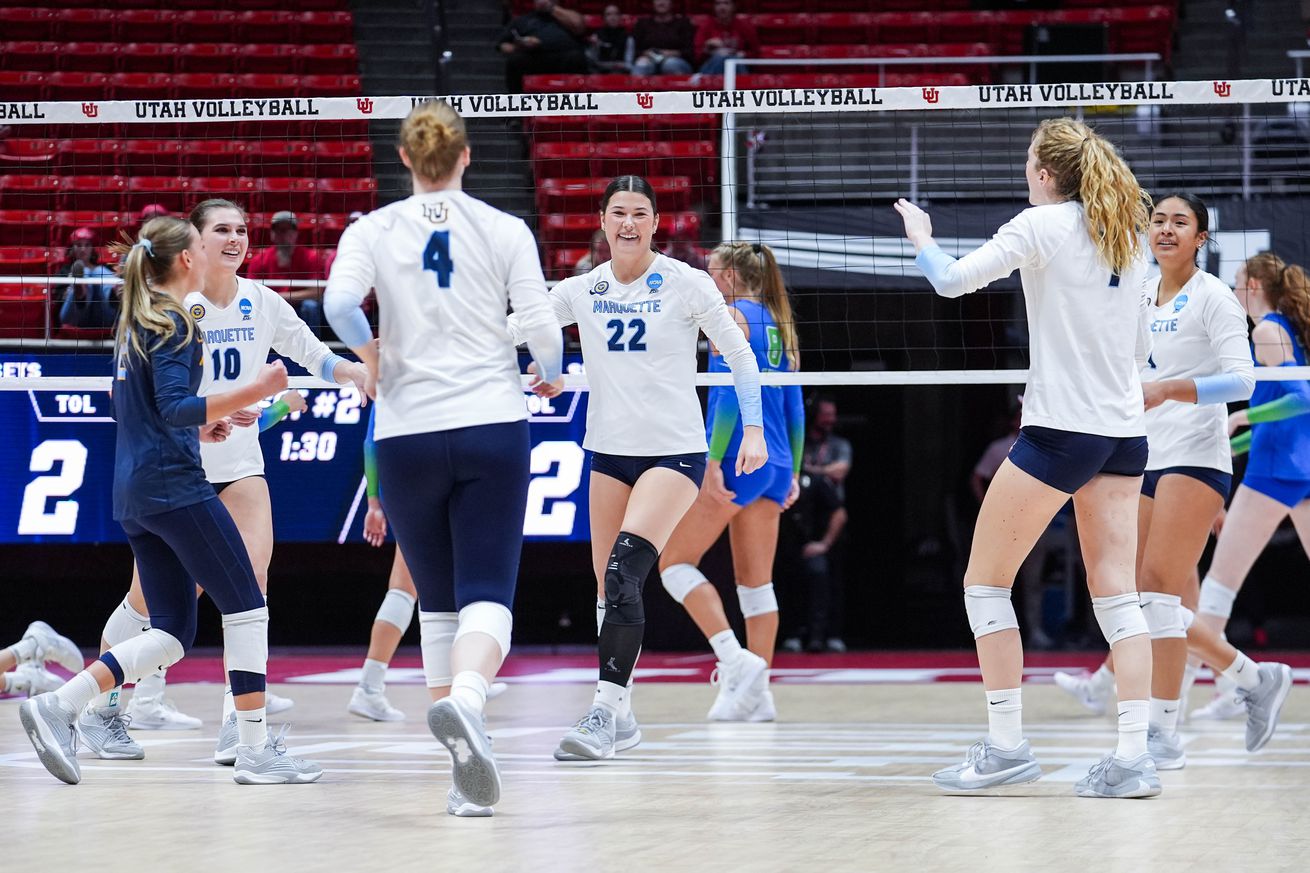 Marquette volleyball celebrates a point against Florida Gulf Coast in the first round of the 2024 NCAA tournament.