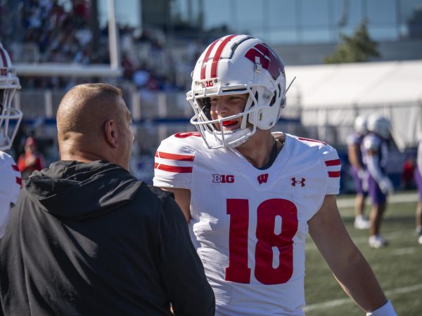 Former offensive coordinator Phil Longo celebrates after quarterback Braedyn Locke performs well at Northwestern. October 19, 2024.  