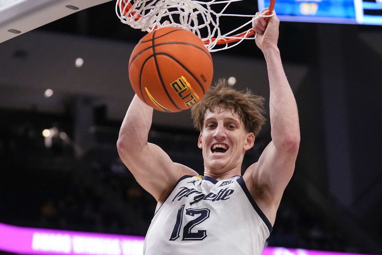 Marquette Golden Eagles forward Ben Gold (12) dunks during the second half against the Butler Bulldogs at Fiserv Forum.