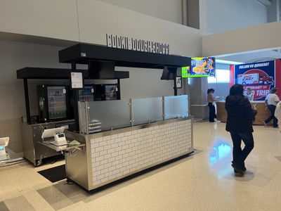 A closed Cookie Dough Shoppe concession stand at Fiserv Forum.