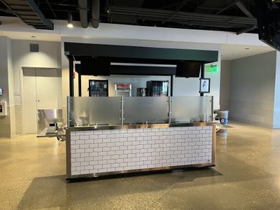 A closed pretzel & nachos concession stand at Fiserv Forum