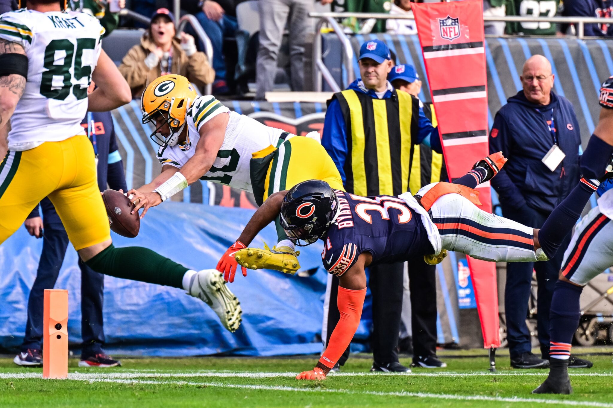 Jordan Love dives for a touchdown in week 11 against the Chicago Bears