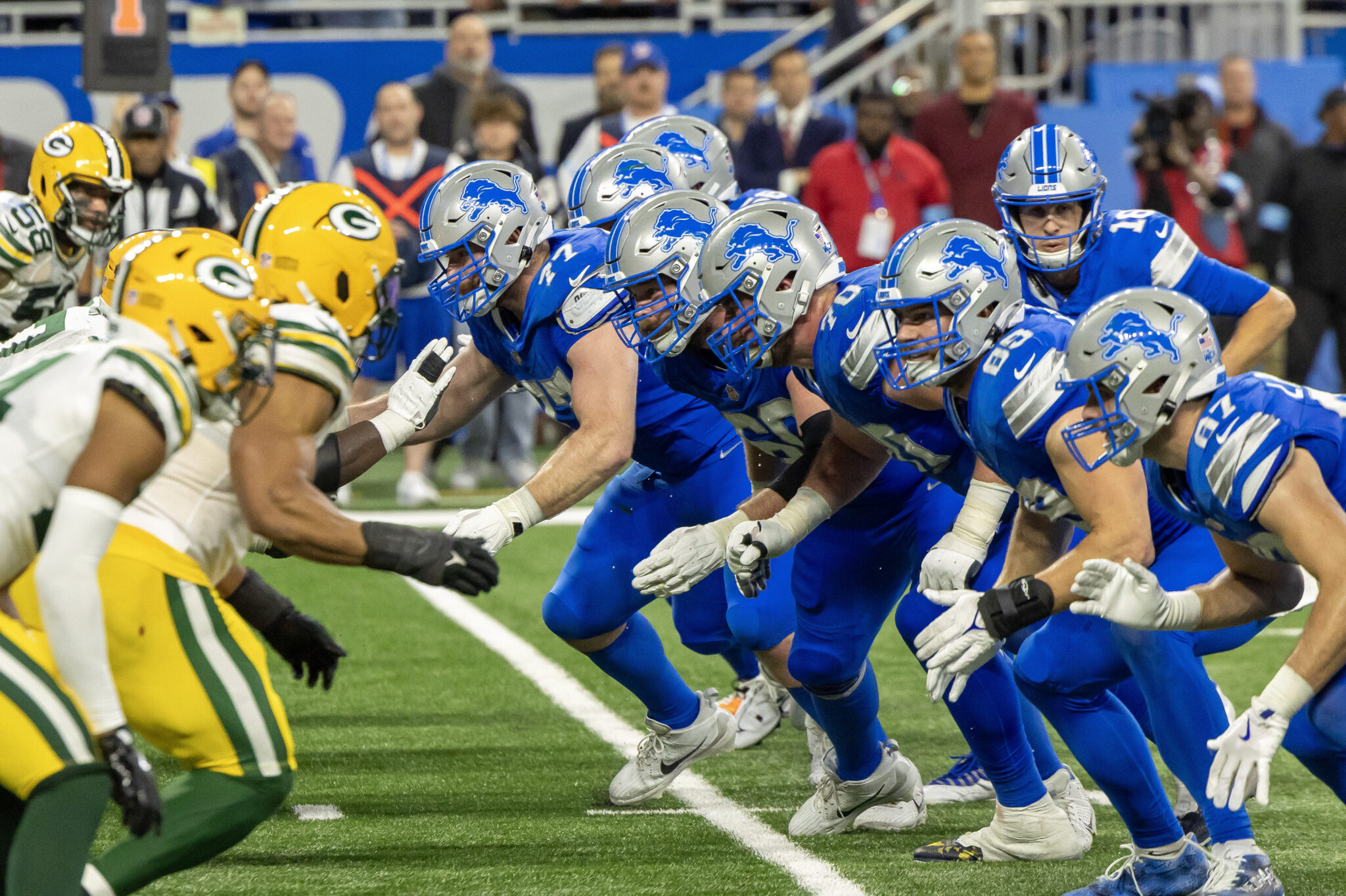 Detroit Lions center Frank Ragnow (77) reacts to the snap against the Green Bay Packers during the fourth quarter at Ford Field.