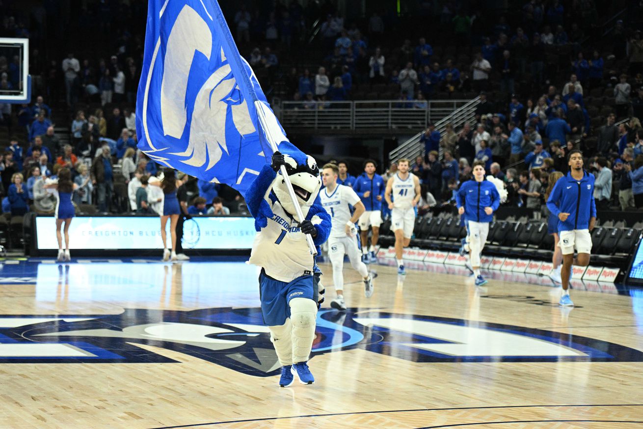 The mascot for the Creighton Bluejays leads the team onto the court before the game against the Houston Christian Huskies at CHI Health Center Omaha.