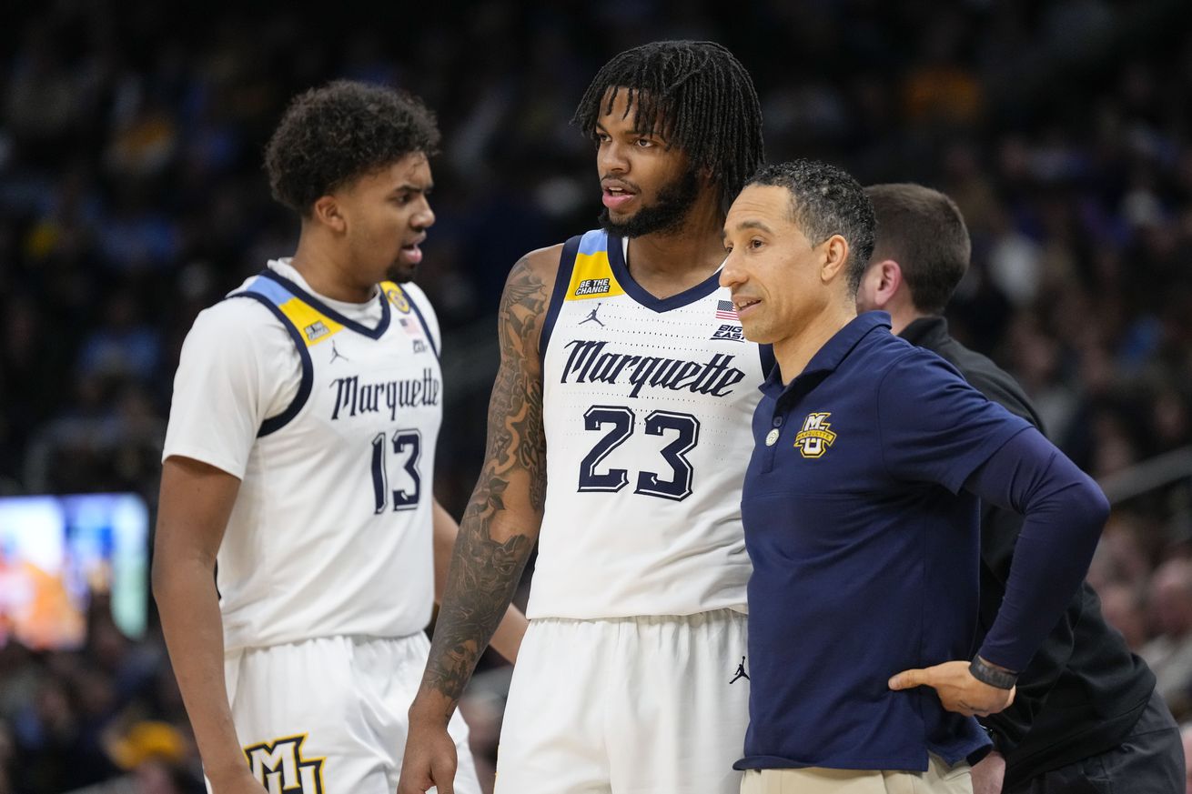 Marquette Golden Eagles head coach Shaka Smart talks with forward David Joplin (23) during the second half against the Georgetown Hoyas at Fiserv Forum. 