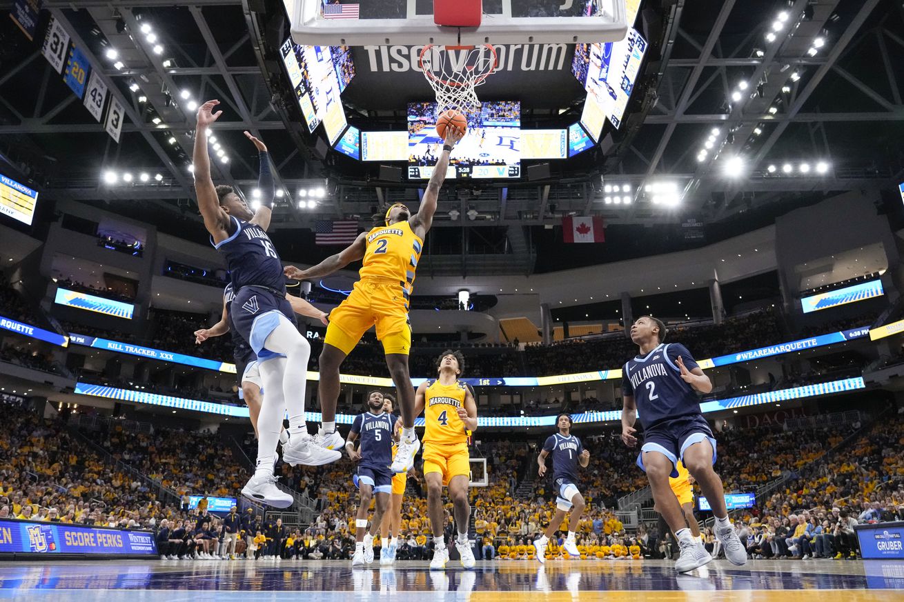 Marquette Golden Eagles guard Chase Ross (2) shoots during the first half against the Villanova Wildcats at Fiserv Forum.