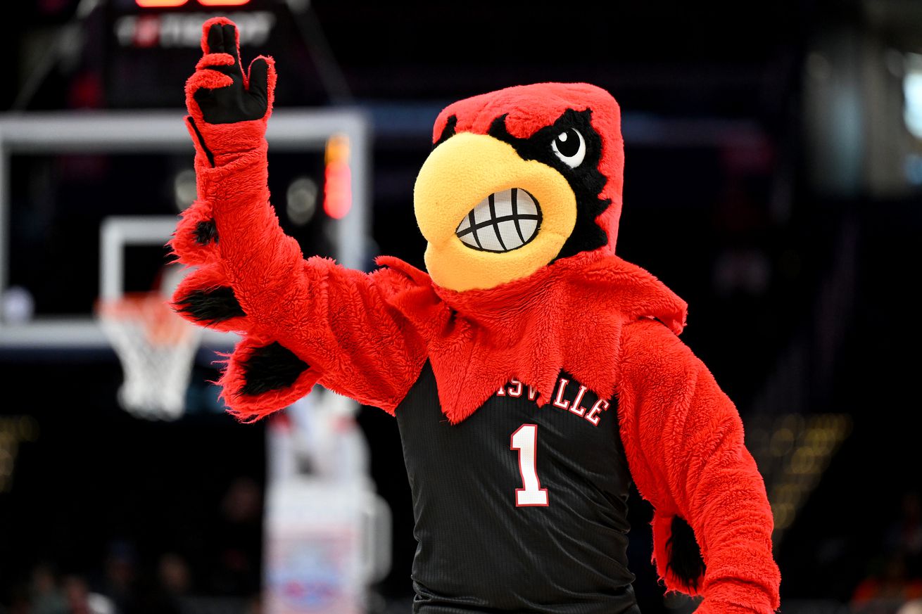 The Louisville Cardinals mascot performs during the game against the North Carolina State Wolfpack in the First Round of the ACC Men’s Basketball Tournament at Capital One Arena on March 12, 2024 in Washington, DC.