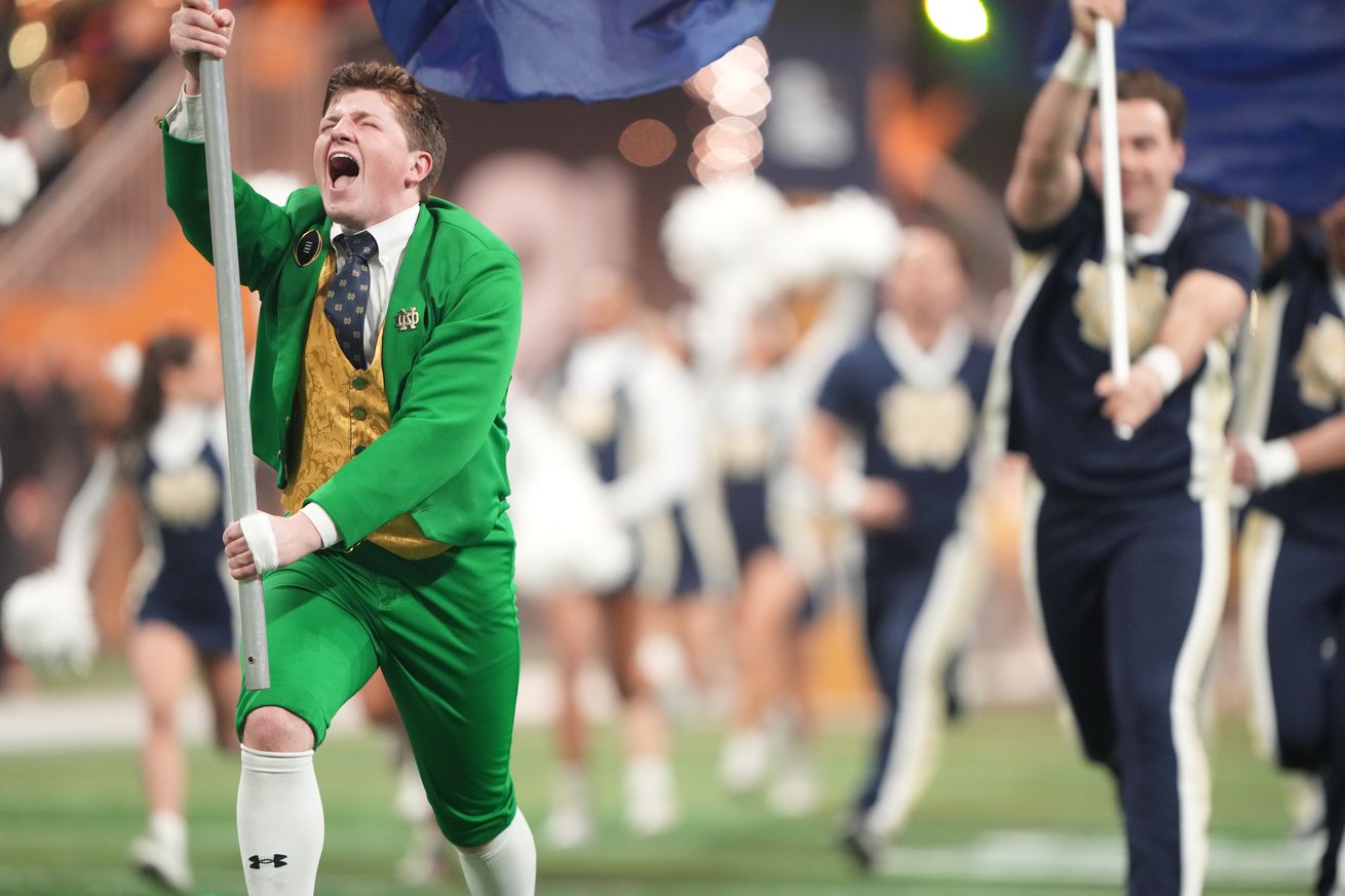 Notre Dame leprechaun mascot Colin Mahoney runs on the field vs Ohio State at Mercedes-Benz Stadium. Atlanta, GA