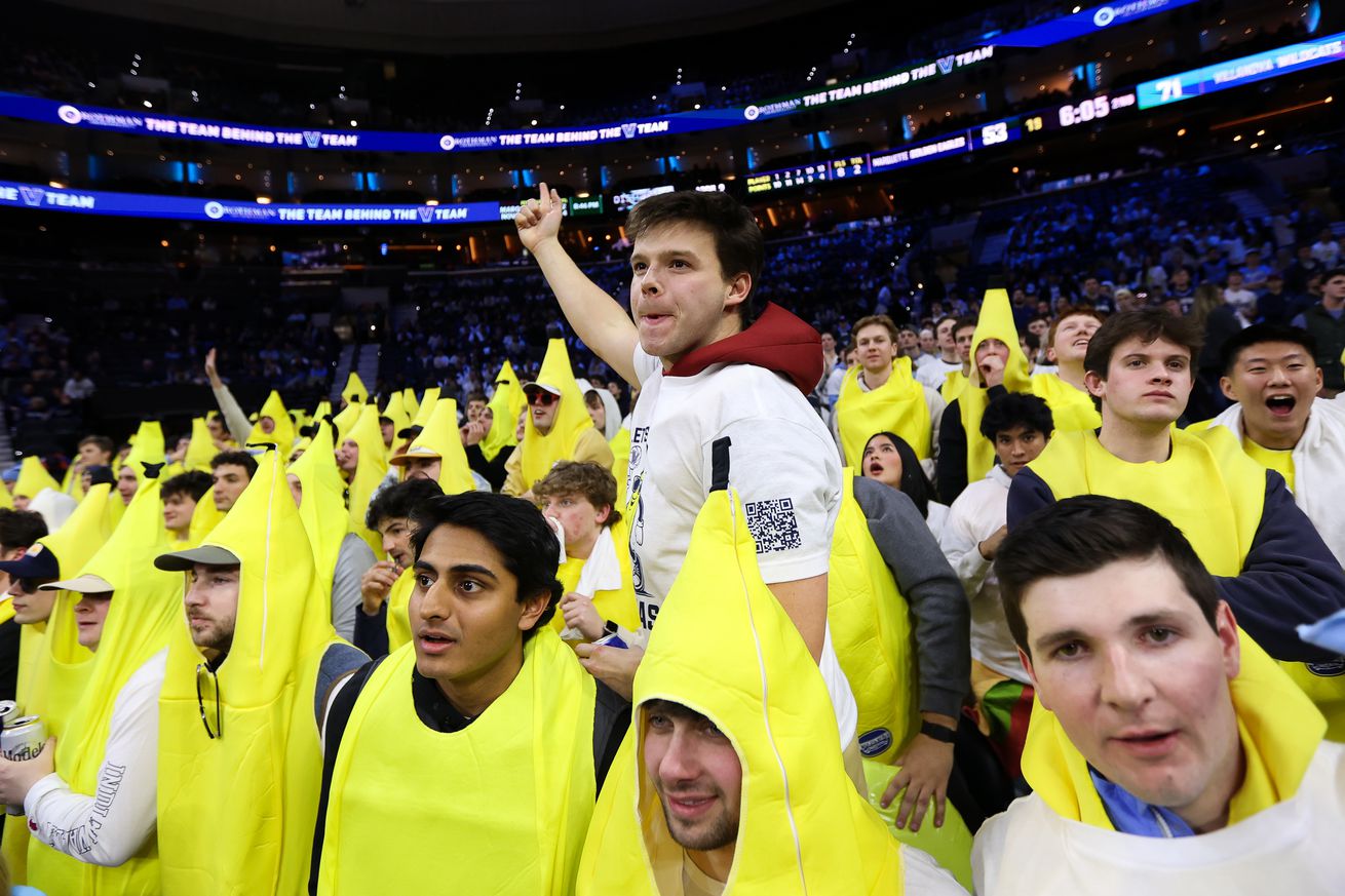 Villanova Wildcats fans dressed in banana costumes cheer on during the second half against the Marquette Golden Eagles at the Wells Fargo Center on February 21, 2025 in Philadelphia, Pennsylvania.