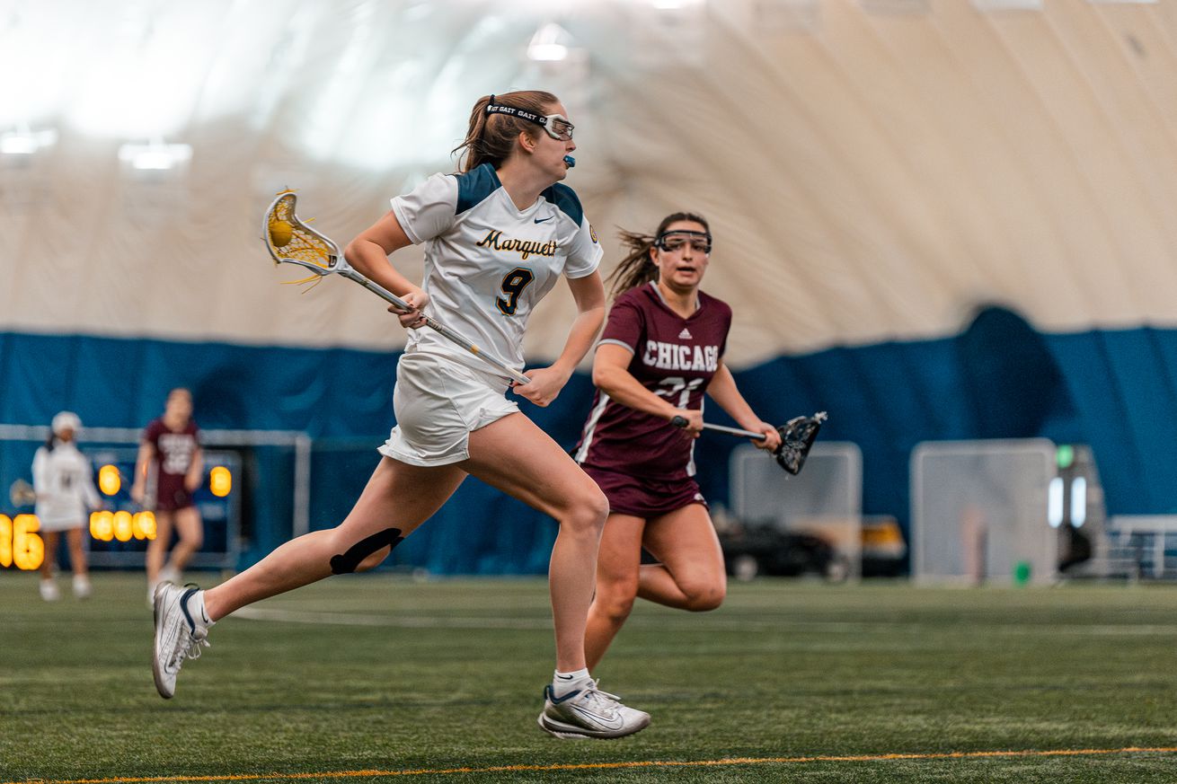 Marquette’s Isabelle Casucci running with the ball against University of Chicago in an exhibition game in the Valley Fields seasonal bubble.