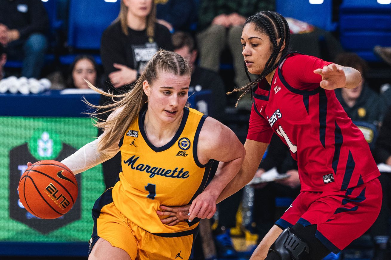 Marquette’s Lee Volker with the ball at the McGuire Center against St. John’s.