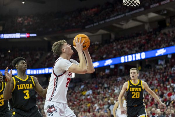 Badger player rebounds a shot against Iowa. January 3, 2025. 