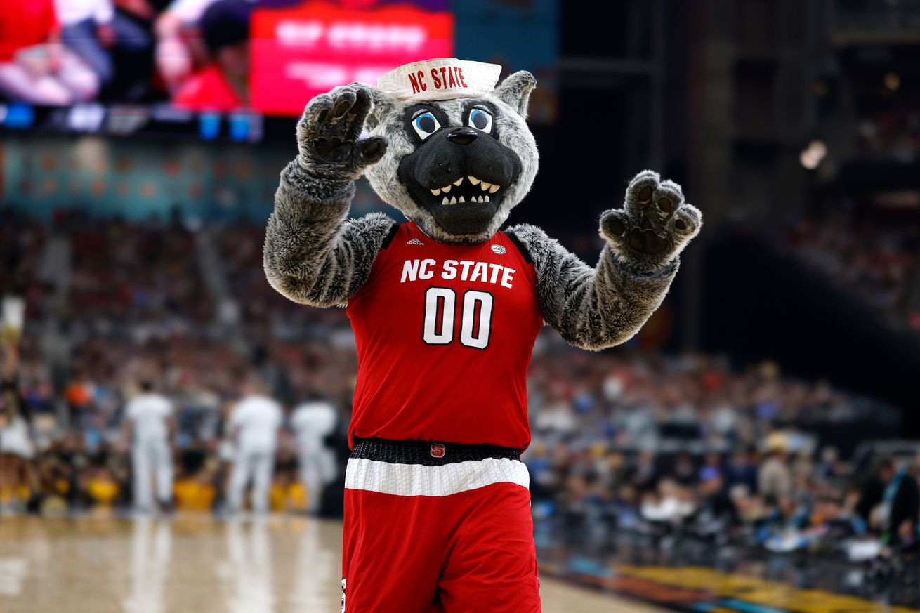 Mr. Wuf, mascot of the NC State Wolfpack, performs against the Purdue Boilermakers in the NCAA Men’s Basketball Tournament Final Four semifinal game at State Farm Stadium on April 6, 2024 in Glendale, Arizona.