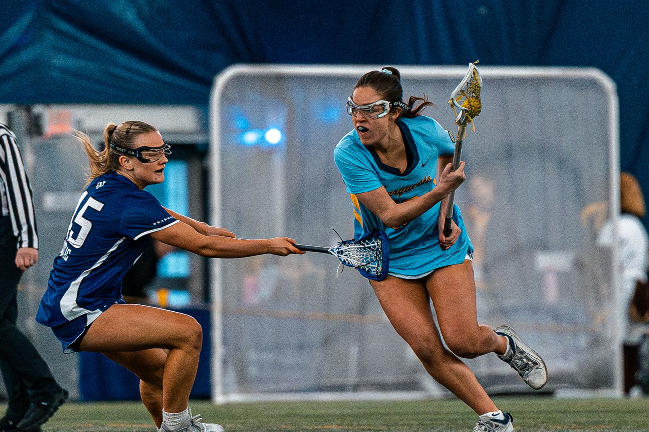 Marquette’s Meg Bireley in action with the ball against Northwestern inside the Valley Fields seasonal bubble.