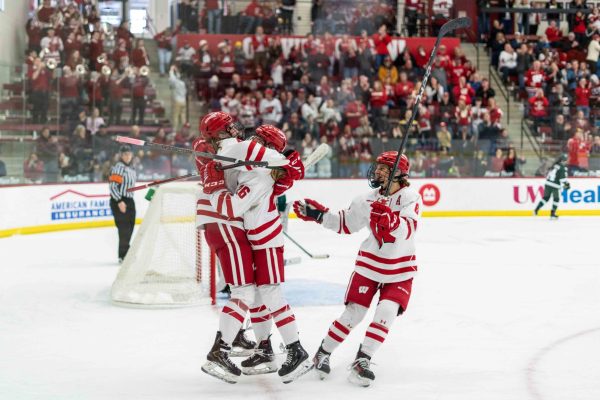 Badger Women's Hockey players celebrate after a goal against Michigan State. March 1, 2025. 